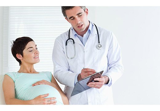 Осмотр беременной врачем